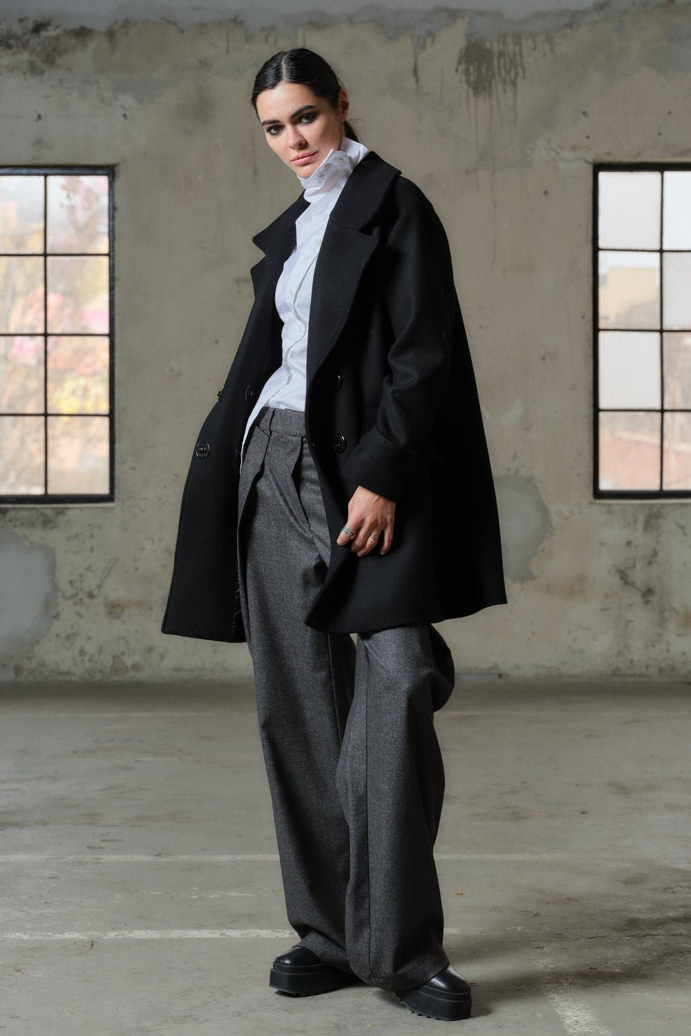 Minimalistic black wool coat