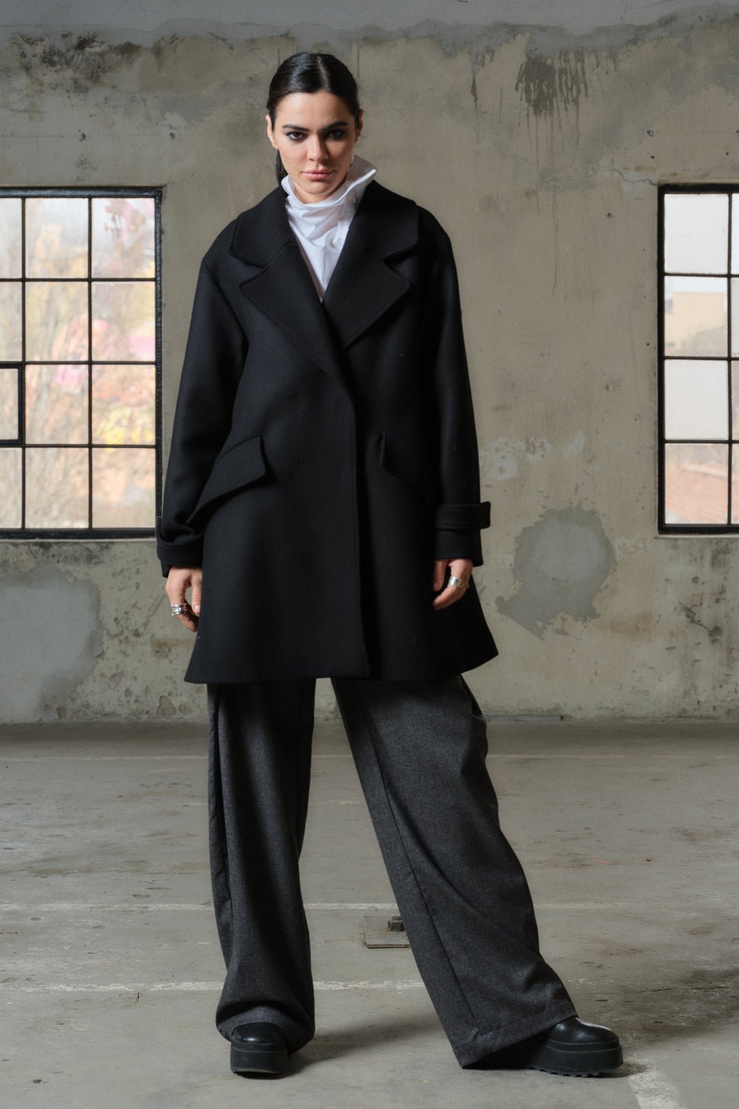 Minimalistic black wool coat