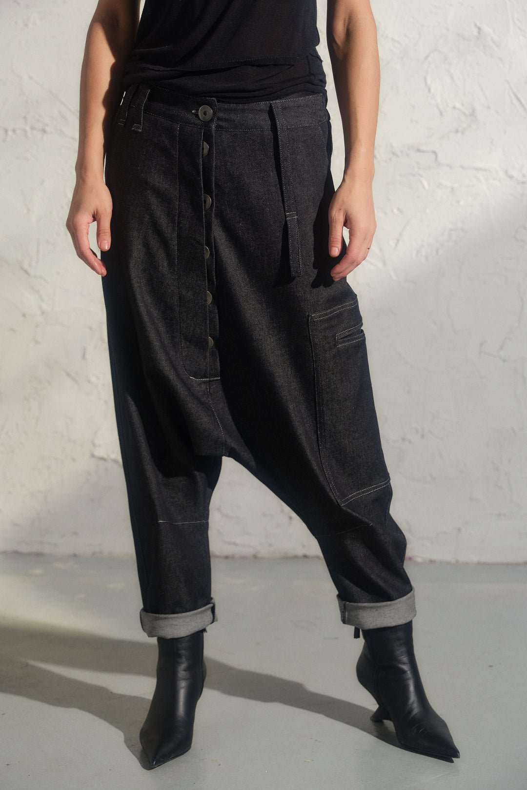 Avant garde denim harem pants with asymmetrical details