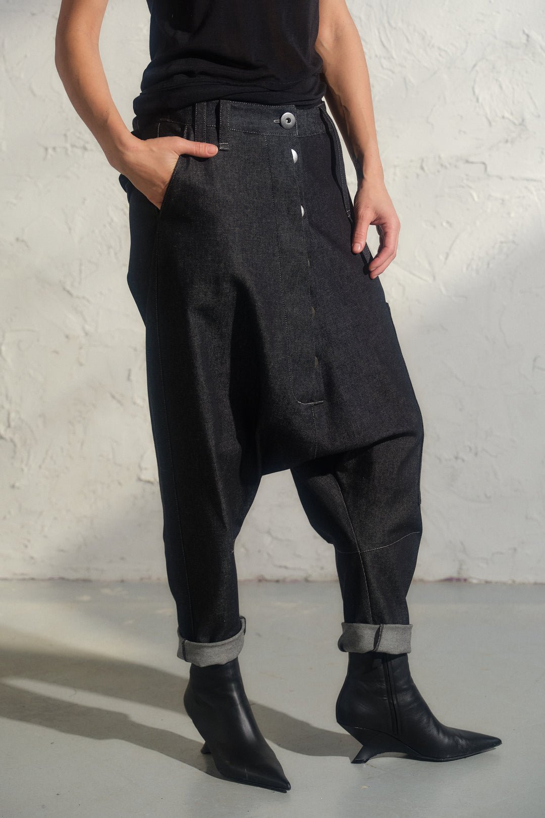 Avant garde denim harem pants with asymmetrical details