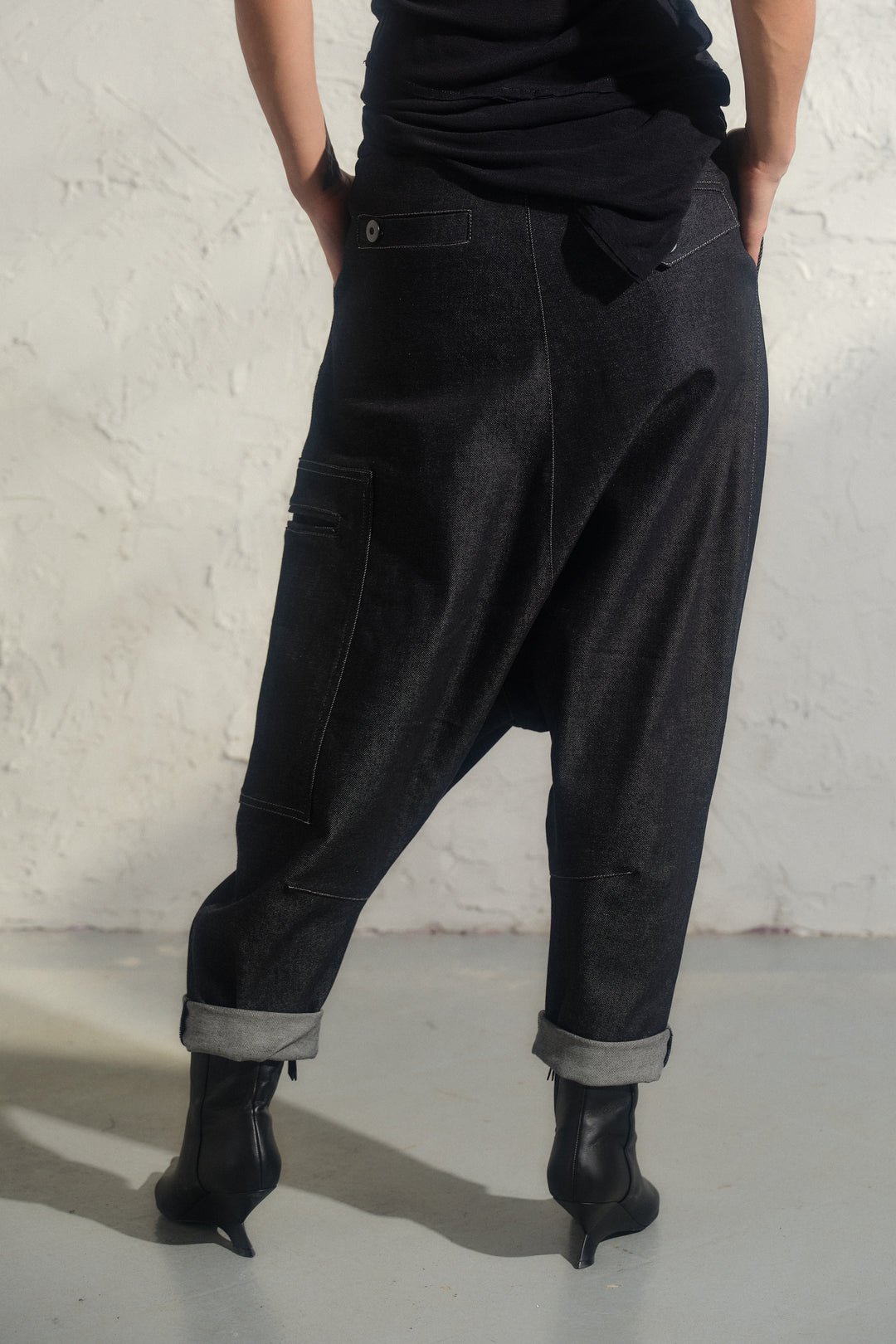 Avant garde denim harem pants with asymmetrical details