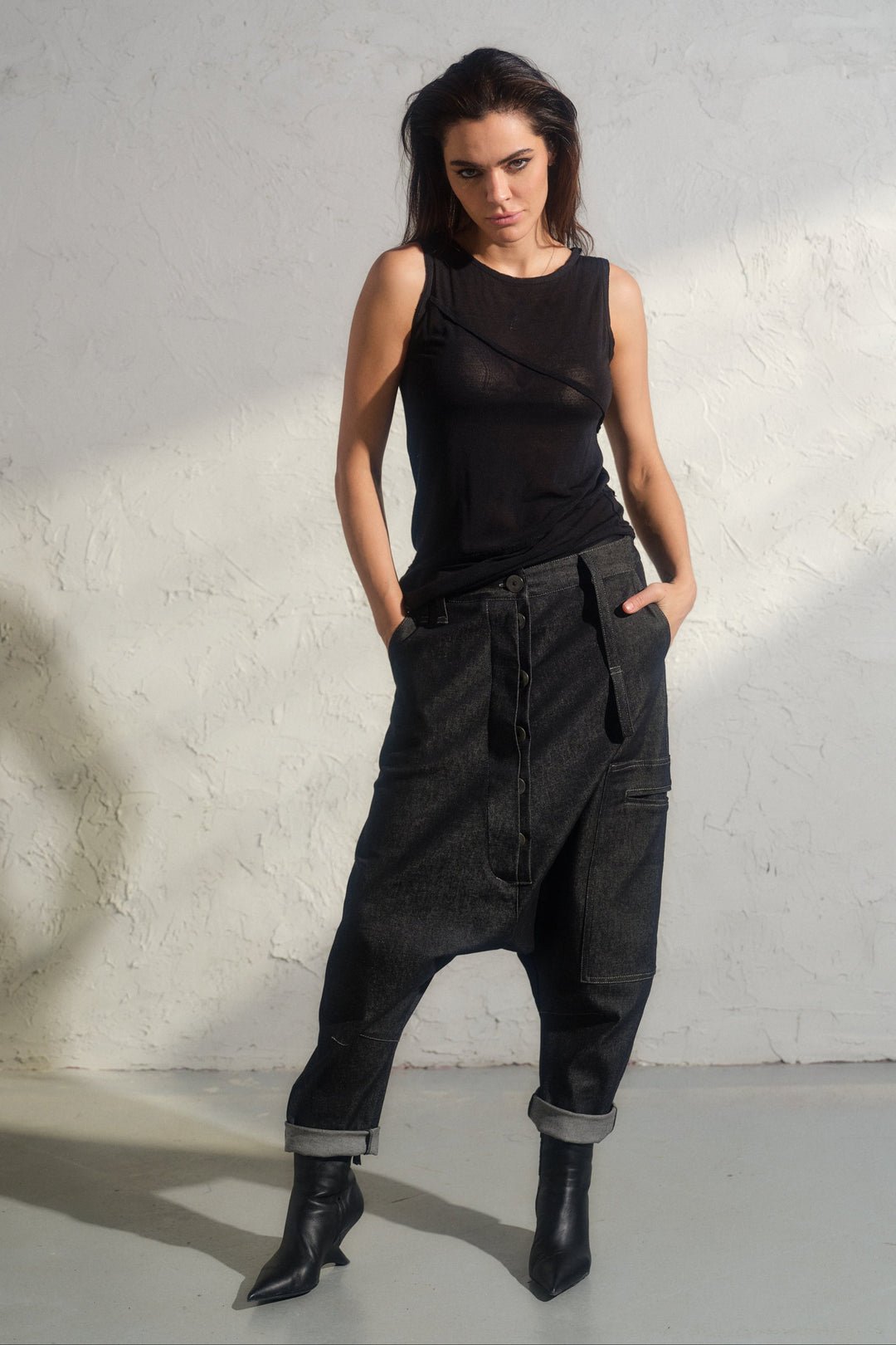 Avant garde denim harem pants with asymmetrical details