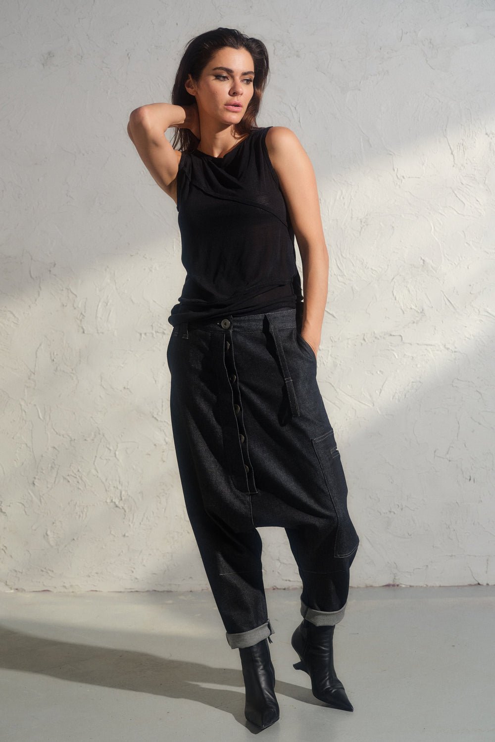 Avant garde denim harem pants with asymmetrical details