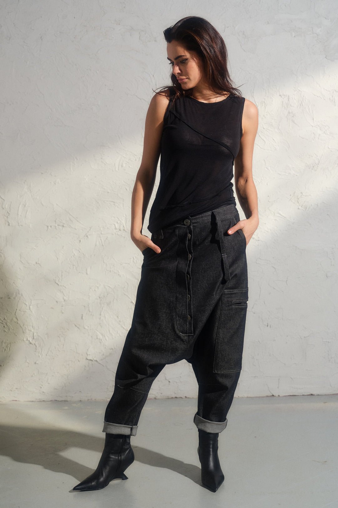 Avant garde denim harem pants with asymmetrical details